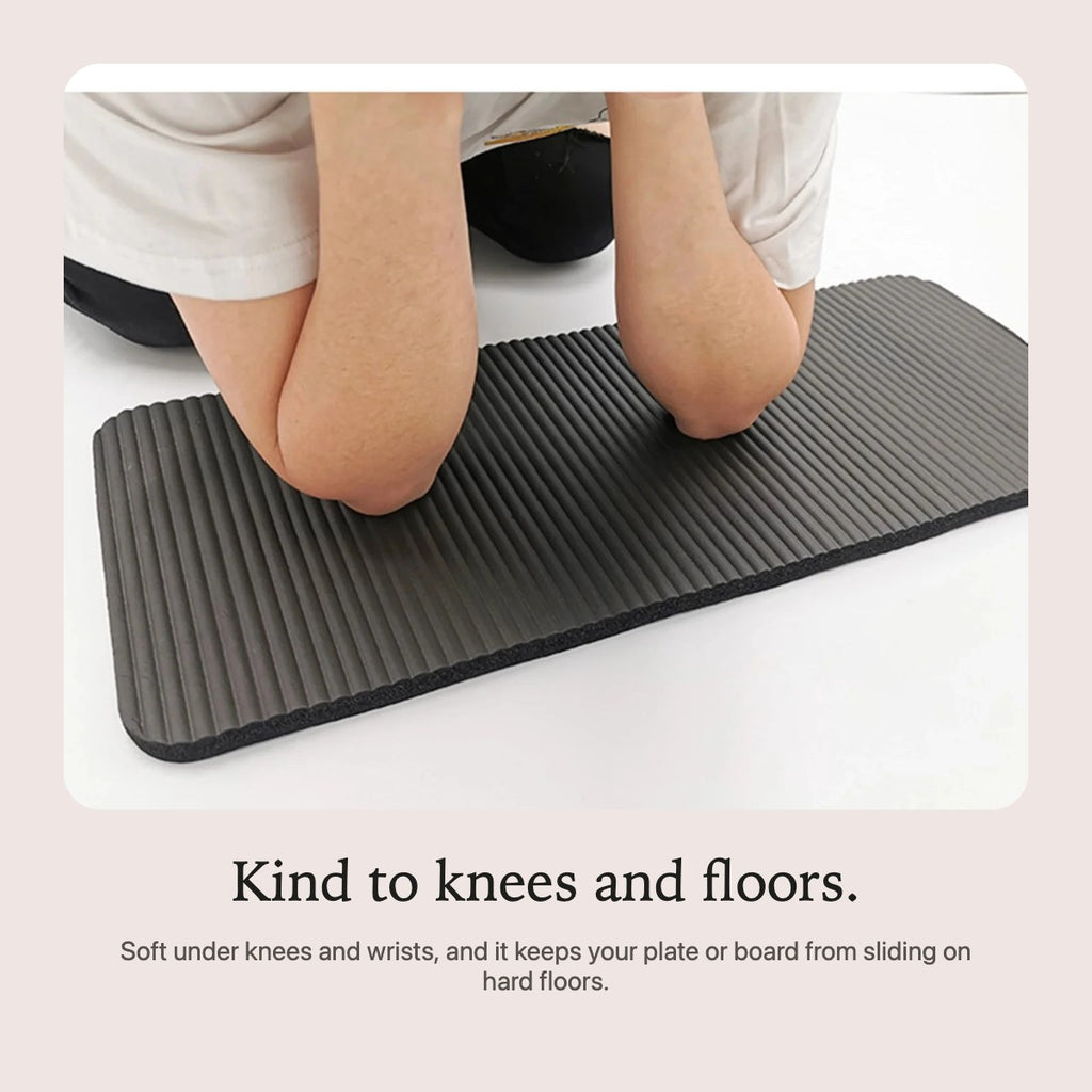 Kneeling on the thick yoga mat